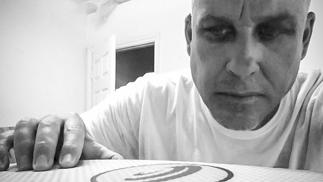 Kirk Brasington puts the finishing touches on a custom Coil
